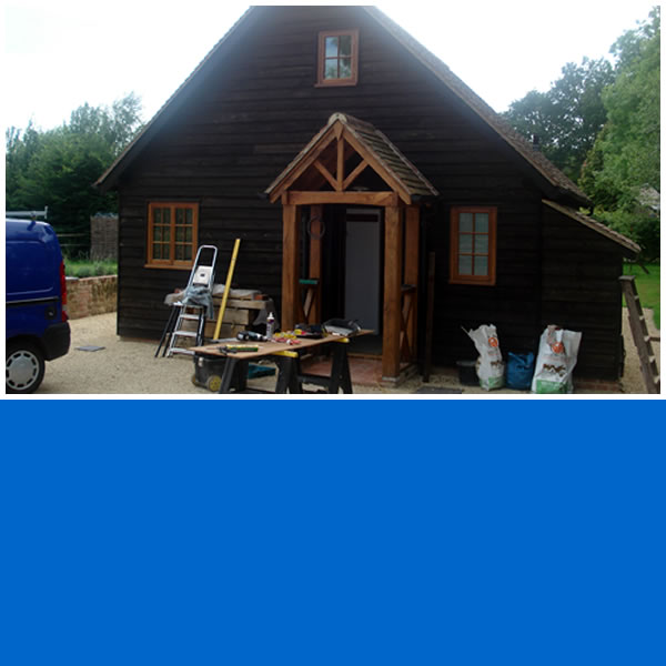 Photo of 'Little House' timber frame building.
