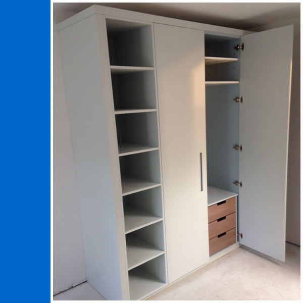 Photo of bespoke fitted wardrobes at Clumps End House, Farnham.